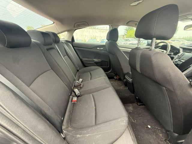 Photo 6 from auction – 2018 HONDA CIVIC LX with VIN 2HGFC2E52JH044615