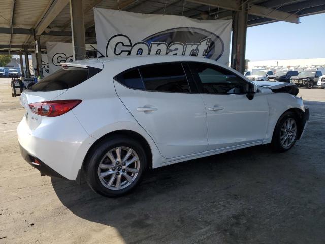 Photo 3 from auction – 2014 MAZDA 3 TOURING with VIN JM1BM1L71E1162250