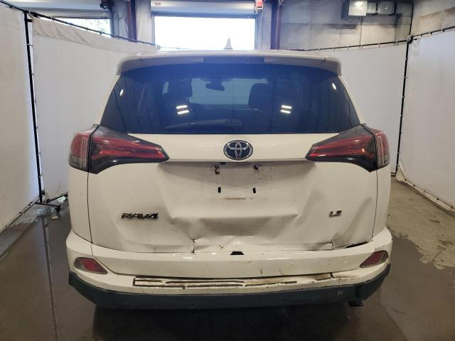 Photo 6 from auction – 2018 TOYOTA RAV4 LE with VIN 2T3ZFREV5JW437729