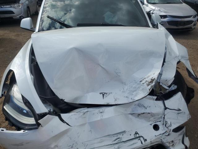 Photo 11 from auction – 2022 TESLA MODEL Y with VIN 7SAYGDEF7NF530836