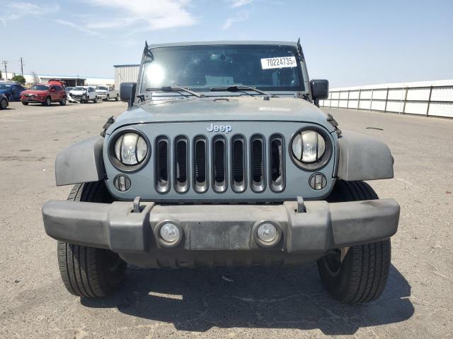 Photo 5 from auction – 2014 JEEP WRANGLER U with VIN 1C4BJWDG8EL314176