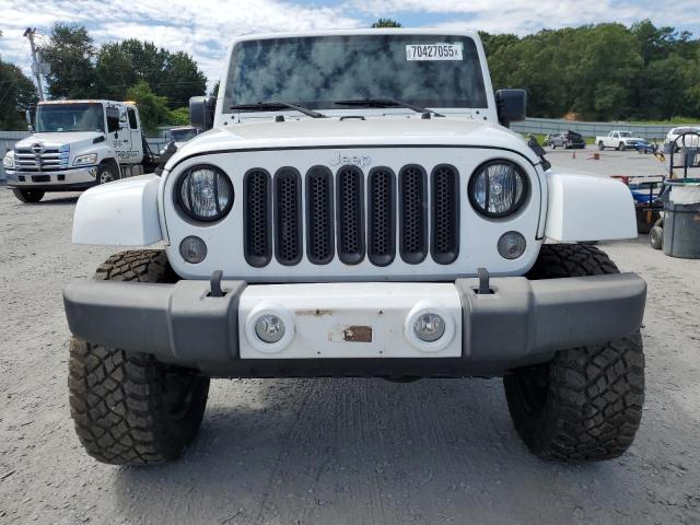 Photo 5 from auction – 2016 JEEP WRANGLER U with VIN 1C4BJWEG1GL172562