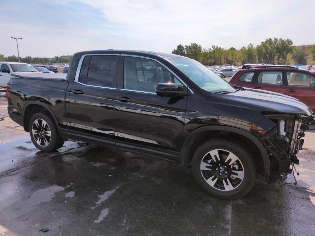 Photo 4 from auction – 2020 HONDA RIDGELINE with VIN 5FPYK3F52LB016604