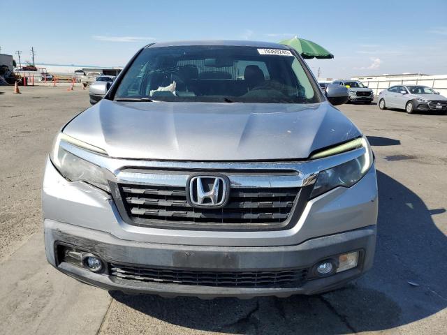 Photo 5 from auction – 2017 HONDA RIDGELINE with VIN 5FPYK2F61HB001229