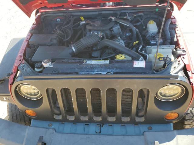 Photo 11 from auction – 2011 JEEP WRANGLER U with VIN 1J4BA5H13BL570019