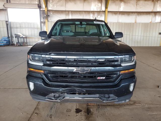 Photo 5 from auction – 2018 CHEVROLET SILVERADO with VIN 3GCUKREC9JG570580