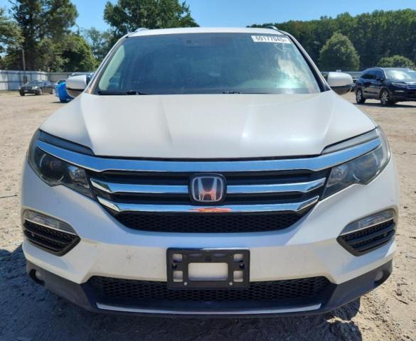 Photo 5 from auction – 2016 HONDA PILOT ELITE with VIN 5FNYF6H05GB106559