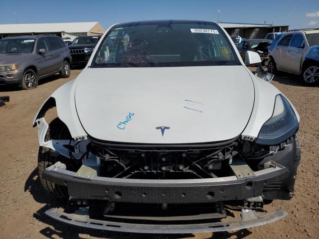 Photo 5 from auction – 2022 TESLA MODEL Y with VIN 7SAYGDEFXNF541930