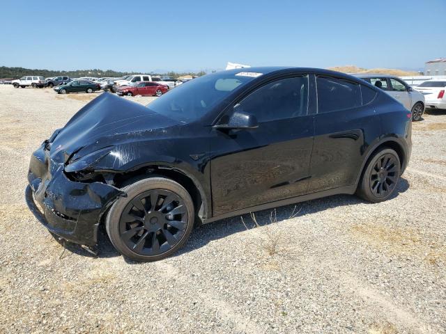 TESLA MODEL Y 2023 with VIN 7SAYGAEE4PF897802 - Photo from auction