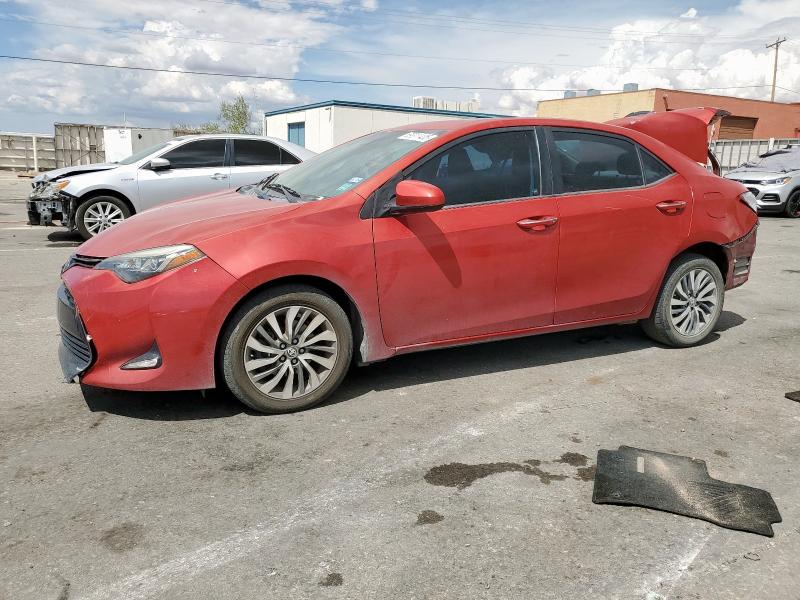 TOYOTA COROLLA L 2018 with VIN 5YFBURHE5JP749823 - Photo from auction