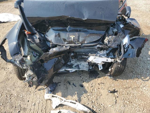 Photo 12 from auction – 2025 TESLA MODEL Y with VIN 7SAYGDEE0SF287521