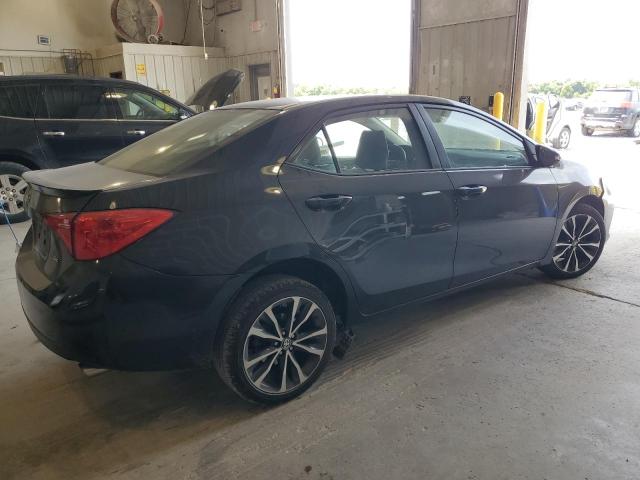 Photo 3 from auction – 2017 TOYOTA COROLLA L with VIN 5YFBURHEXHP692979
