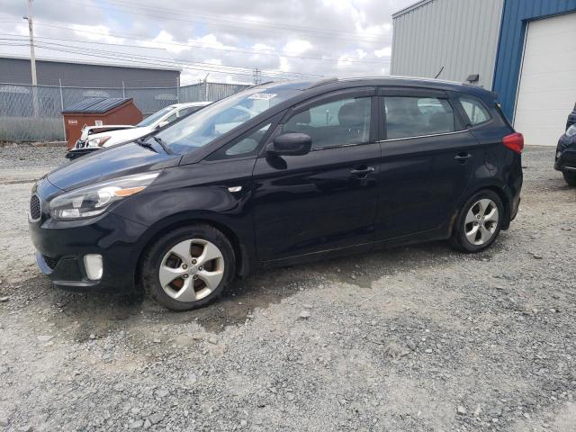 KIA RONDO 2014 with VIN KNAHT8A3XE7052975 - Photo from auction