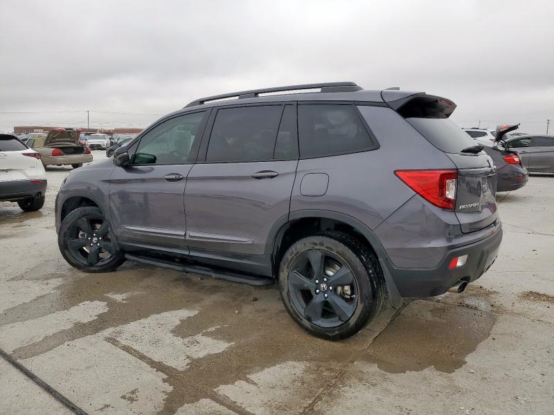 Photo 2 from auction – 2020 HONDA PASSPORT E with VIN 5FNYF8H06LB018920