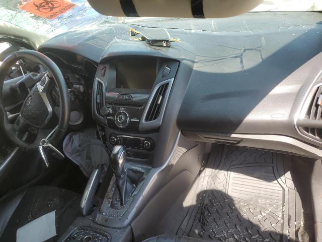Photo 8 from auction – 2013 FORD FOCUS TITA with VIN 1FADP3J26DL334543
