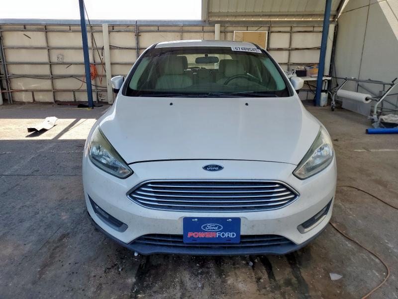Photo 5 from auction – 2017 FORD FOCUS TITA with VIN 1FADP3N25HL272875