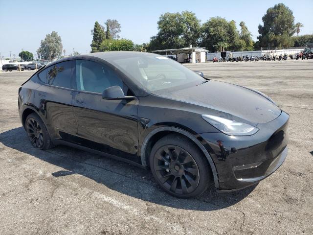 Photo 4 from auction – 2025 TESLA MODEL Y with VIN 7SAYGDED2SF308702