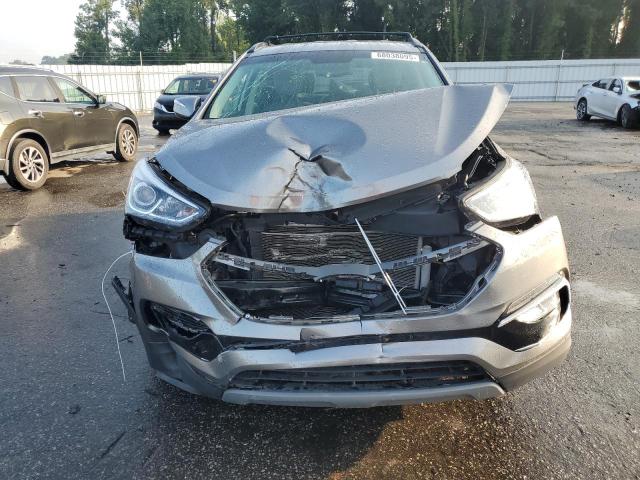 Photo 5 from auction – 2018 HYUNDAI SANTA FE S with VIN 5NMZU3LB1JH100474