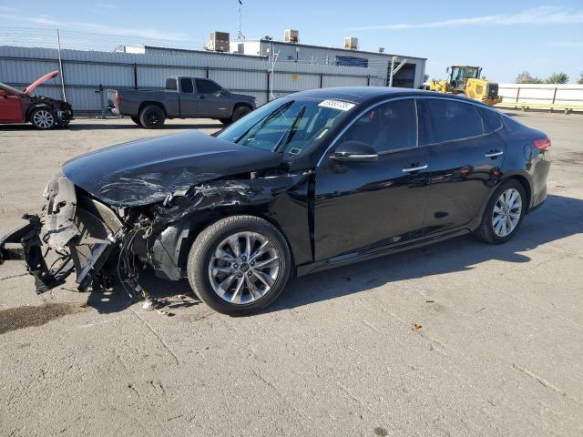 KIA OPTIMA 2018 with VIN 5XXGU4L34JG181748 - Photo from auction
