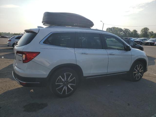 Photo 3 from auction – 2022 HONDA PILOT TOUR with VIN 5FNYF5H61NB003005