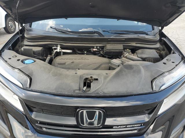 Photo 12 from auction – 2022 HONDA PILOT BLAC with VIN 5FNYF6H76NB041957