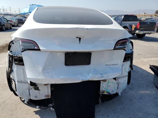 Photo 6 from auction – 2021 TESLA MODEL Y with VIN 5YJYGDEE6MF276586