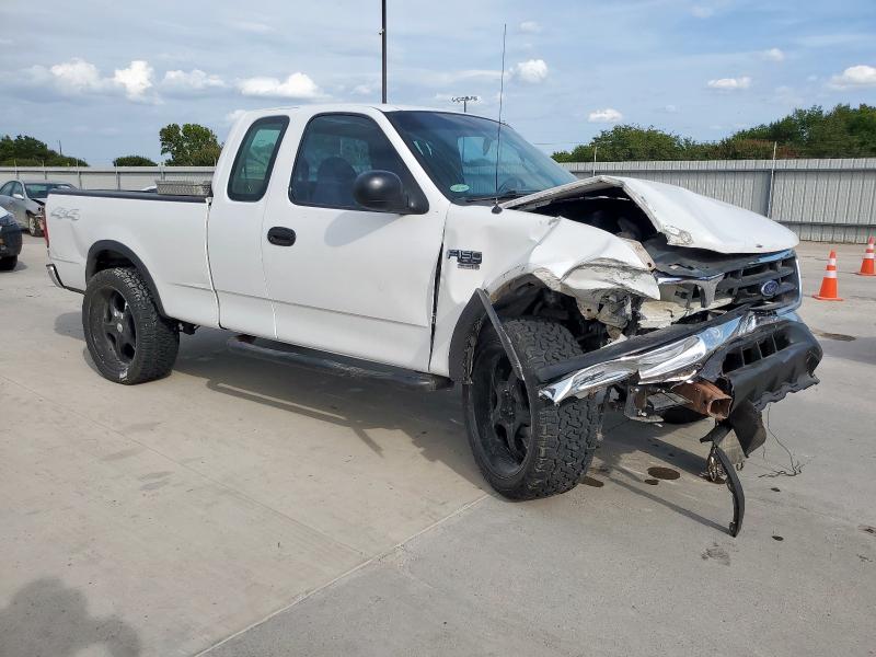 Photo 4 from auction – 2000 FORD F150 with VIN 1FTRX18L7YNB50273