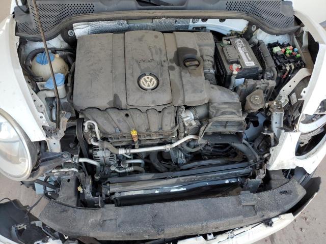 Photo 11 from auction – 2014 VOLKSWAGEN BEETLE with VIN 3VWFP7AT6EM601065