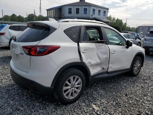 Photo 3 from auction – 2014 MAZDA CX-5 TOURING with VIN JM3KE4CYXE0321304