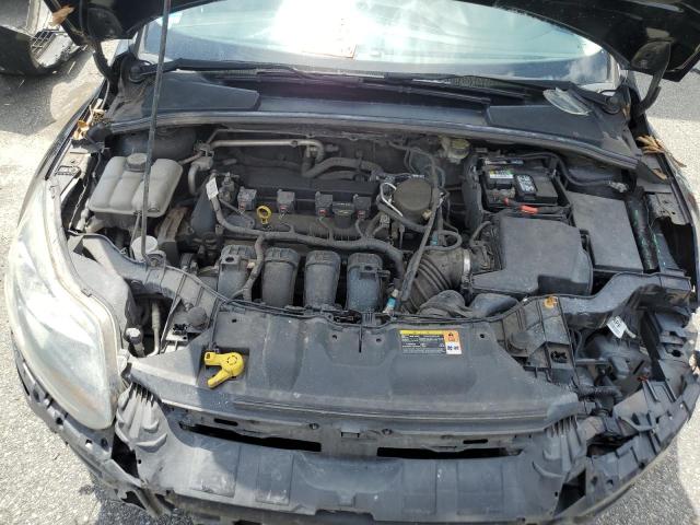 Photo 11 from auction – 2013 FORD FOCUS TITA with VIN 1FADP3J23DL295099