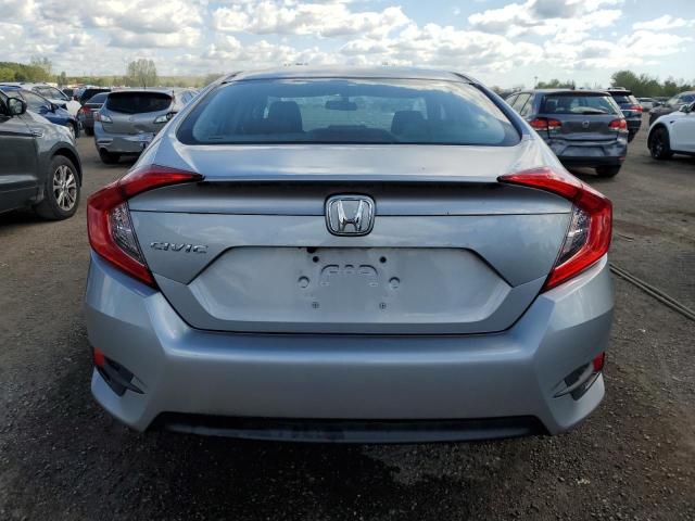 Photo 6 from auction – 2018 HONDA CIVIC LX with VIN 2HGFC2F50JH037029