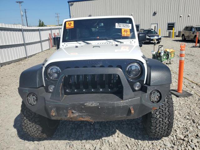 Photo 5 from auction – 2015 JEEP WRANGLER U with VIN 1C4BJWDG8FL587510