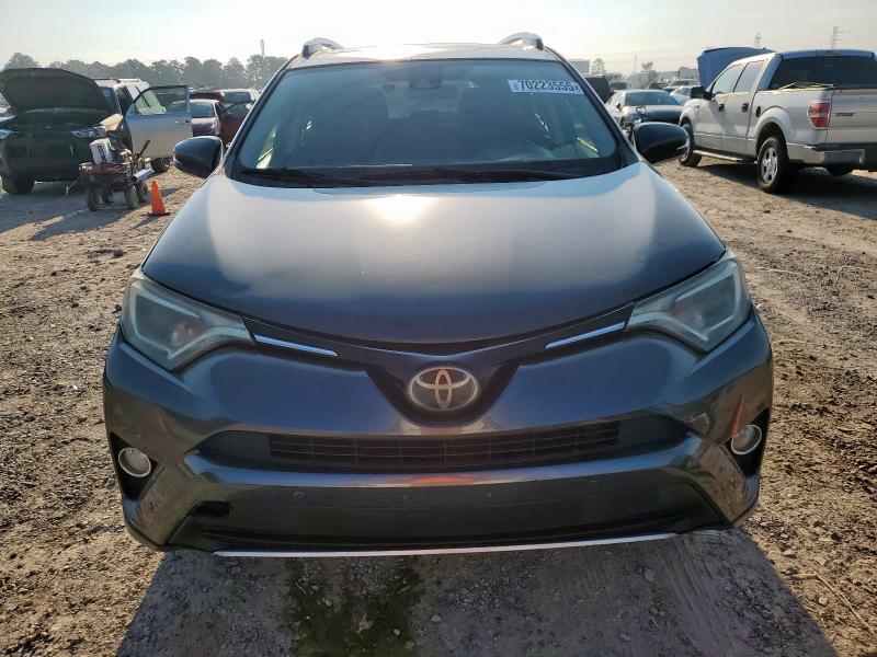 Photo 5 from auction – 2017 TOYOTA RAV4 XLE with VIN JTMWFREV6HD106488