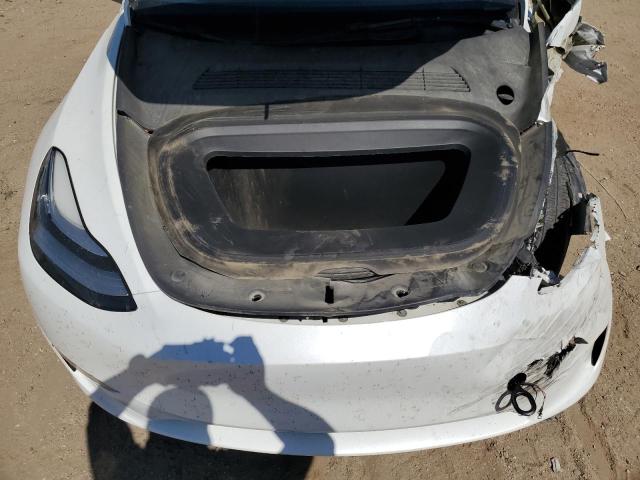 Photo 11 from auction – 2023 TESLA MODEL Y with VIN 7SAYGDEE0PA121326