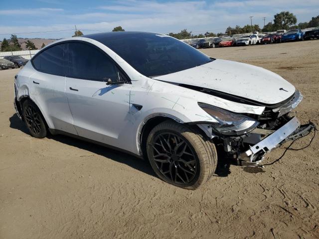 Photo 4 from auction – 2023 TESLA MODEL Y with VIN 7SAYGDEF8PF815693