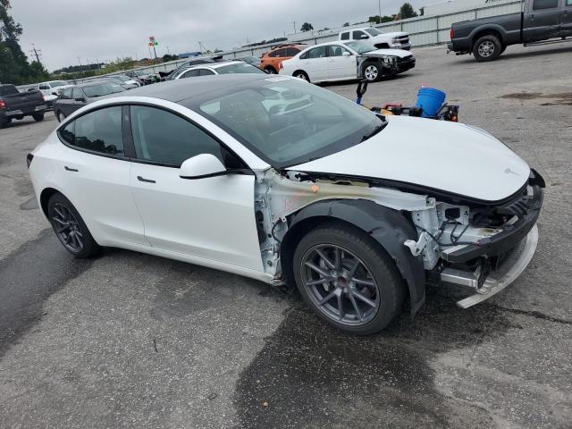 Photo 4 from auction – 2021 TESLA MODEL 3 with VIN 5YJ3E1EA5MF090386