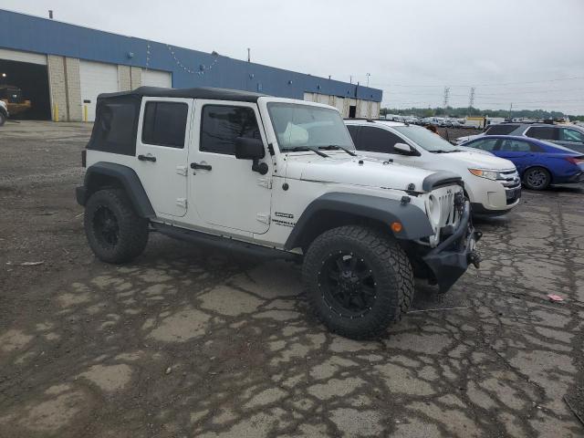 Photo 4 from auction – 2016 JEEP WRANGLER U with VIN 1C4BJWDG0GL117831