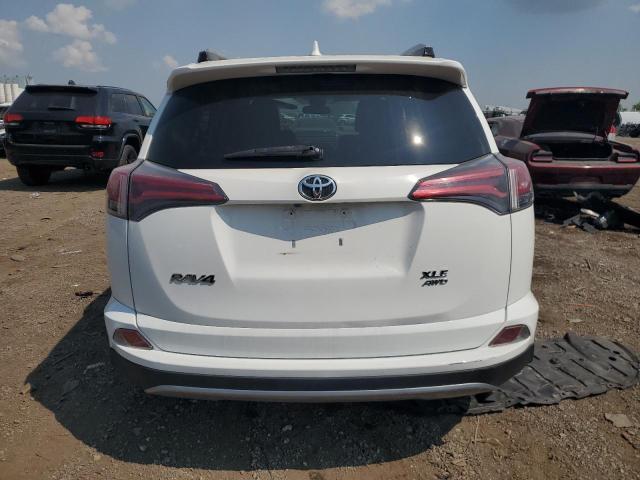 Photo 6 from auction – 2017 TOYOTA RAV4 XLE with VIN JTMRFREV7HJ105008