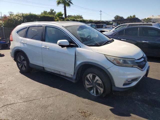 Photo 4 from auction – 2016 HONDA CR-V TOURING with VIN 5J6RM3H95GL017086
