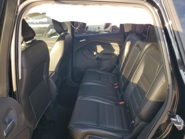 Photo 11 from auction – 2018 FORD ESCAPE TITANIUM with VIN 1FMCU0J9XJUA51753