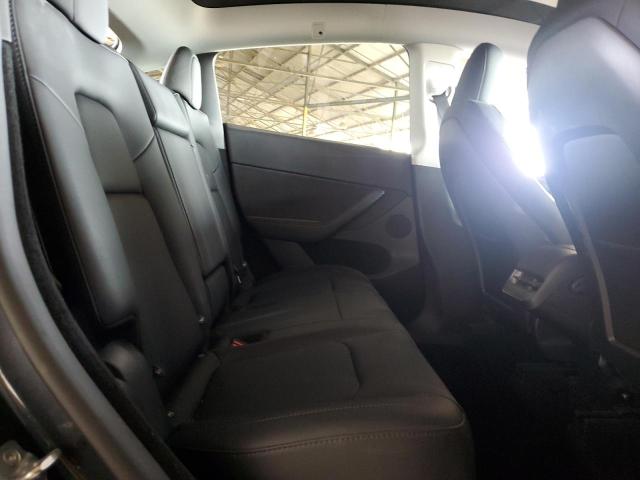 Photo 10 from auction – 2025 TESLA MODEL Y with VIN 7SAYGDED9SF316277