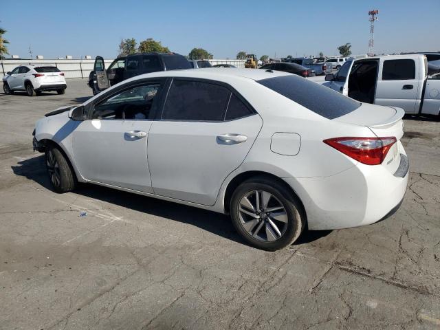 Photo 2 from auction – 2014 TOYOTA COROLLA EC with VIN 5YFBPRHE0EP113582