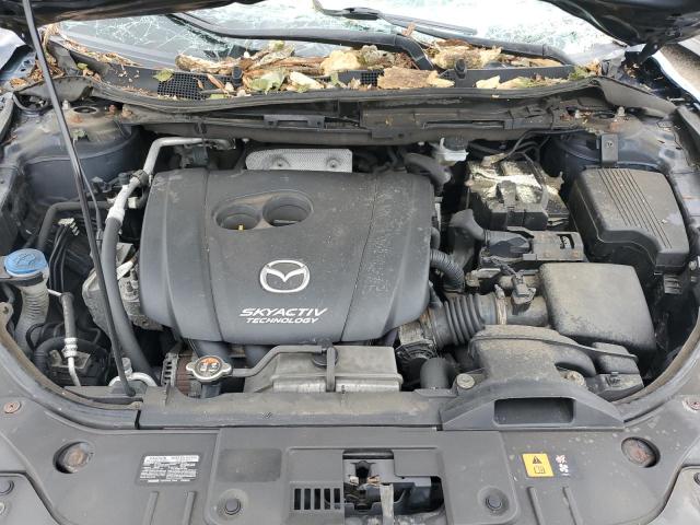 Photo 12 from auction – 2015 MAZDA CX-5 SPORT with VIN JM3KE2BE4F0530664