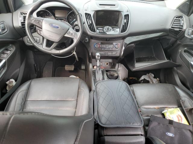 Photo 8 from auction – 2017 FORD ESCAPE TITANIUM with VIN 1FMCU9J94HUD63792