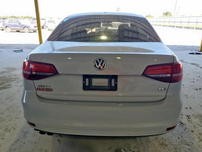 Photo 6 from auction – 2018 VOLKSWAGEN JETTA S with VIN 3VW2B7AJ3JM249472