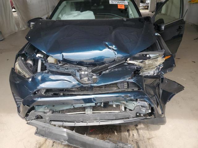Photo 11 from auction – 2018 TOYOTA RAV4 LE with VIN JTMBFREV8JJ734431