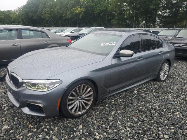 BMW M550XI 2018 with VIN WBAJB9C50JB036915 - Photo from auction