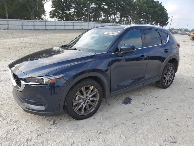 MAZDA CX-5 SIGNA 2021 with VIN JM3KFBEY4M0444870 - Photo from auction