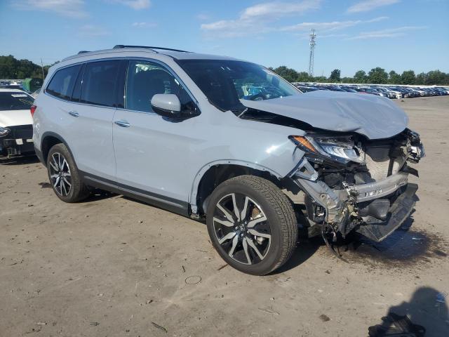 Photo 4 from auction – 2022 HONDA PILOT TOUR with VIN 5FNYF6H63NB077922