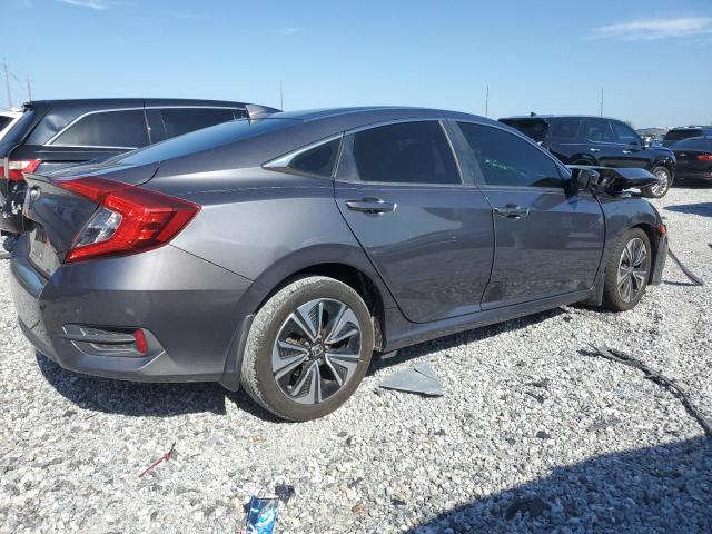 Photo 3 from auction – 2018 HONDA CIVIC EX with VIN JHMFC1F31JX042774